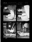 Young man receives gift; Group at piano (4 Negatives) (April 22, 1958) [Sleeve 21, Folder e, Box 14]